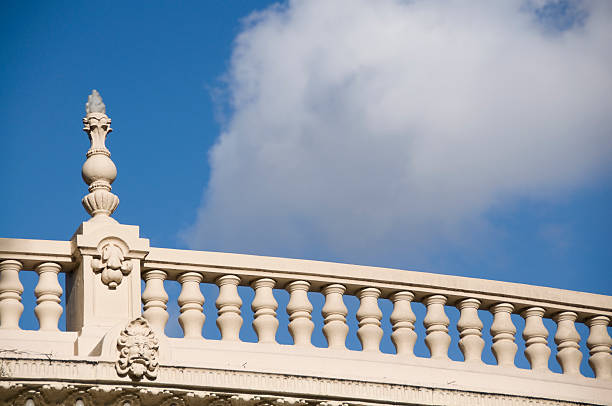 Neo classical railing Neo classical railing against a blue sky gargoyl stock pictures, royalty-free photos & images