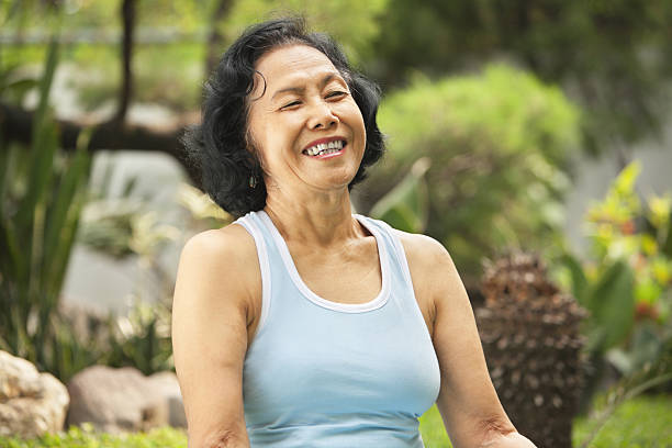 istock Senior woman laught at park 152537760