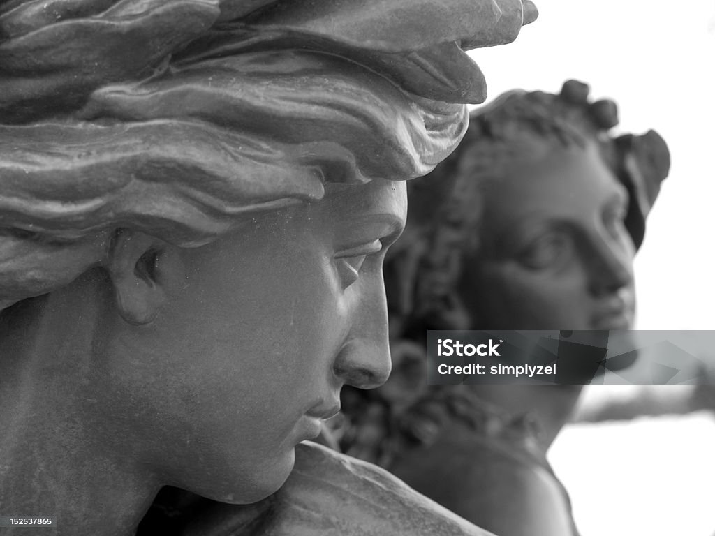 French Statues Young male carved statue glancing over at a young female carved statue. Old Town, Quebec City, Quebec, Canada. Statue Stock Photo