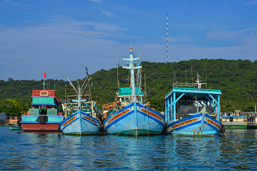 Tho Chau, Vietnam - Dec 14, 2017. Wooden boats docking at pier in Tho Chau Island, Vietnam. Tho Chau Islands (Poulo Panjang) is an archipelago in the Gulf of Thailand.