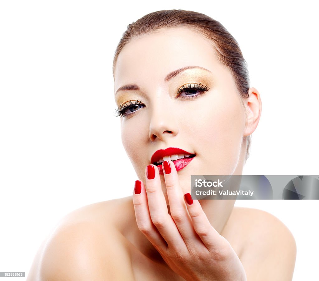 Portrait of sensuality glamour woman Close-up portrait of sexy caucasian young woman with golden glamour make-up and red bright manicure 20-29 Years Stock Photo