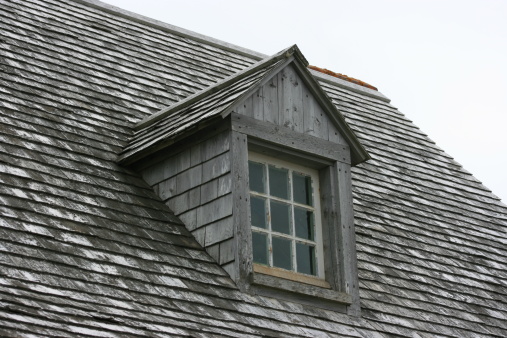 Dormer and window on a old historic roof top. Canon rebel.