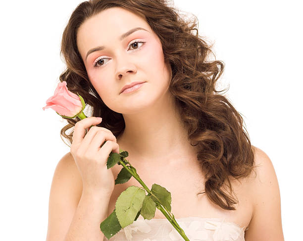istock beauty woman with rose 152538622