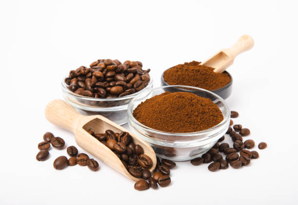 istock Ground coffee and coffee beans isolated on white background. 1525388147