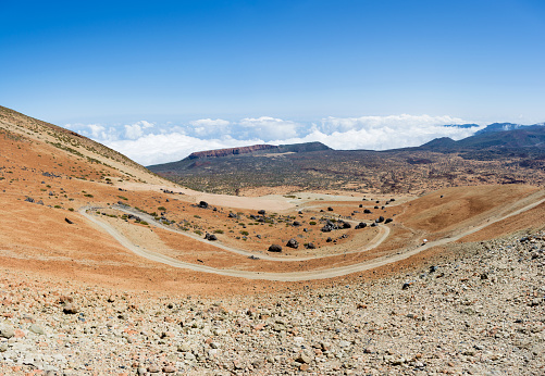 Panoramic view of the sharp serpentine road on the way to Altavista Refuge. Teide Volcano in Tenerife, Canary Islands.
