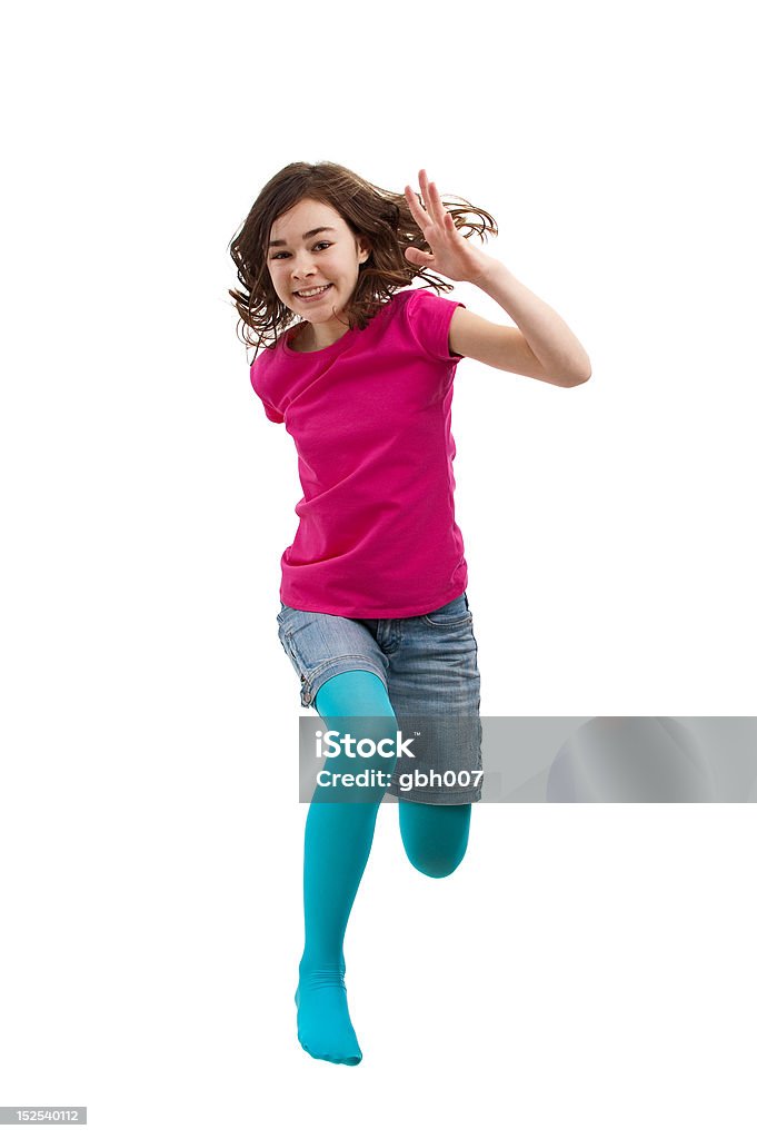 Девушка прыжки изолированные на белом фоне - Стоковые фото 14-15 лет роялти-фри