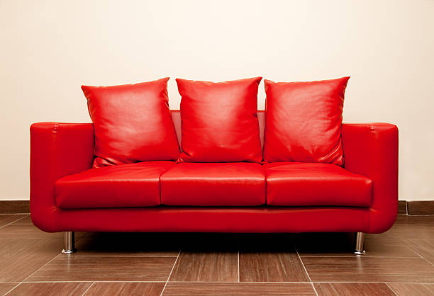 Red leather sofa stock photo