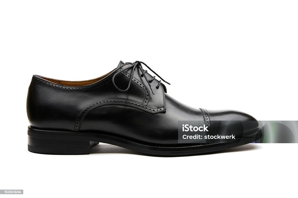 Black Business Shoe Black leather men's dress shoe on white background Shoe Stock Photo