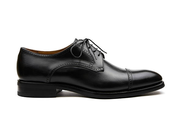 Black Business Shoe Black leather men's dress shoe on white background brogue photos stock pictures, royalty-free photos & images
