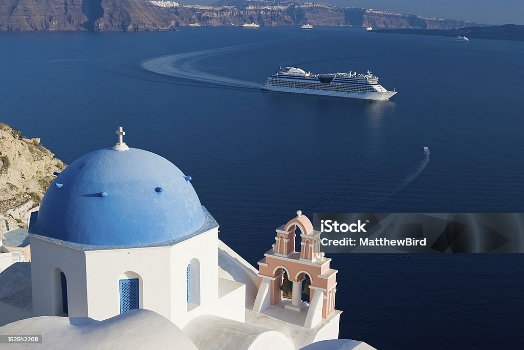 Mediterranean Cruise Cruise Ship in Santorini, Greece Cruise Ship Stock Photo