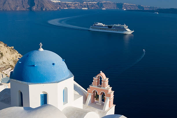 Mediterranean Cruise Cruise Ship in Santorini, Greece cruise ship photos stock pictures, royalty-free photos & images
