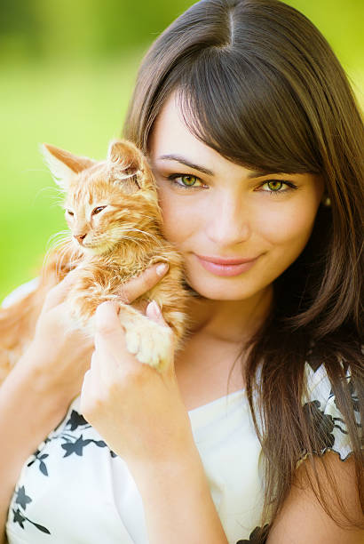 istock Beautiful girl with kitten 152542527