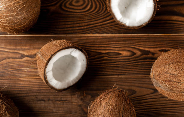 istock Coconuts on a wooden background. Close-up. 1525425358