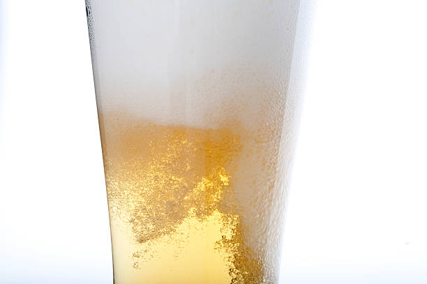 istock part of beer glass with bubble macro 152542656