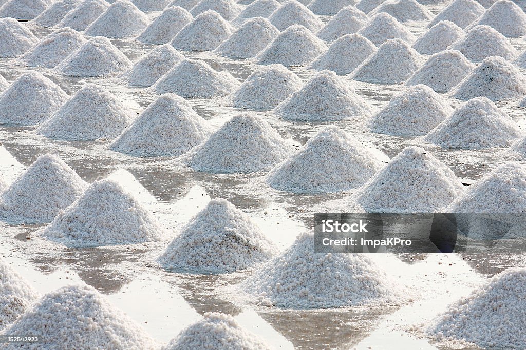 Salt field Heap of sea salt in a field prepared for harvest Agriculture Stock Photo