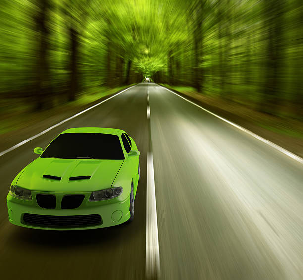 istock green car on road 152543315