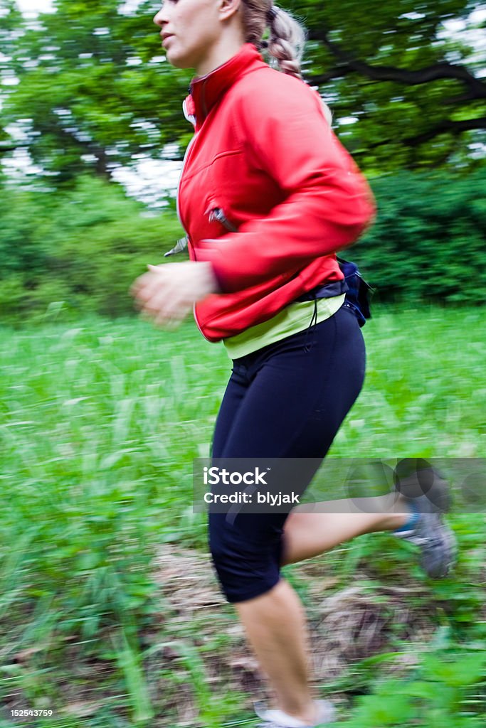 Corsa cross-country - Foto stock royalty-free di Adulto