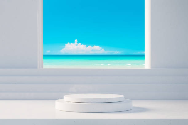 istock 3D podium with copy space for product display presentation on beach with blue sky and white clouds abstract background. Tropical summer and vacation concept. Graphic rendering illustration design. 1525440265