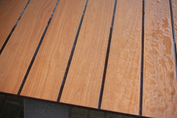 istock Wet boards. Rain outside. Water on table. 1525441909