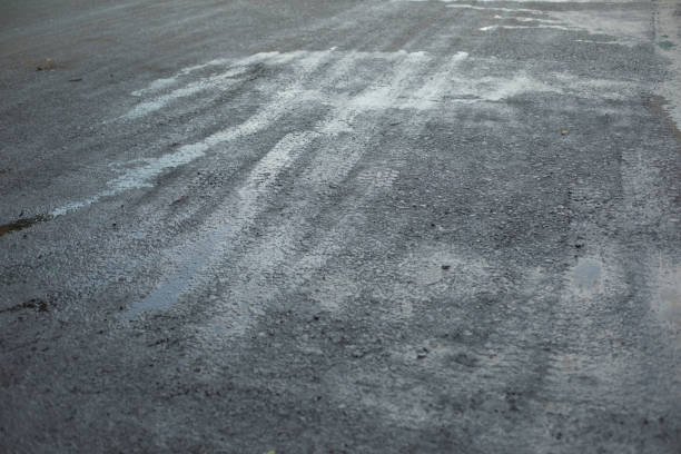 istock Black asphalt. New pavement. Texture of asphalt. 1525442444
