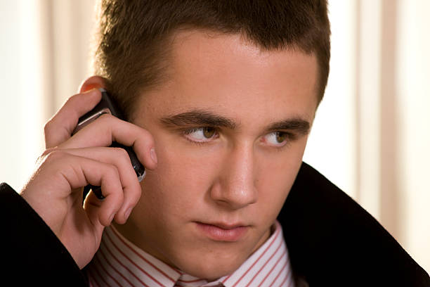 istock Young businessman talking on cellphone 152544536