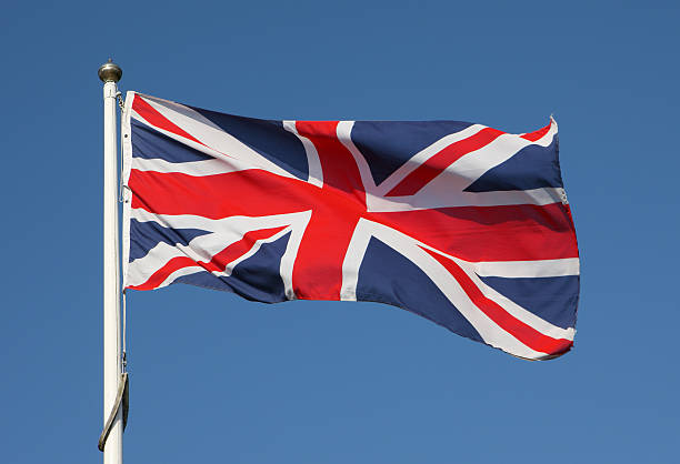 British Union Jack Flag Flying stock photo