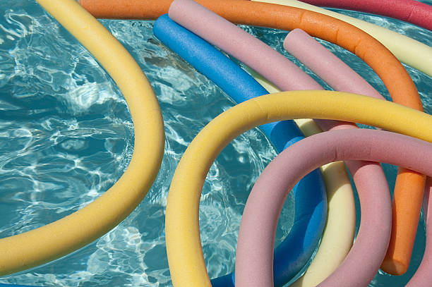 Swimming pool noodles create an interesting and colorful composition.