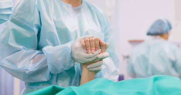 istock surgeons in hospital operating room 1525467951