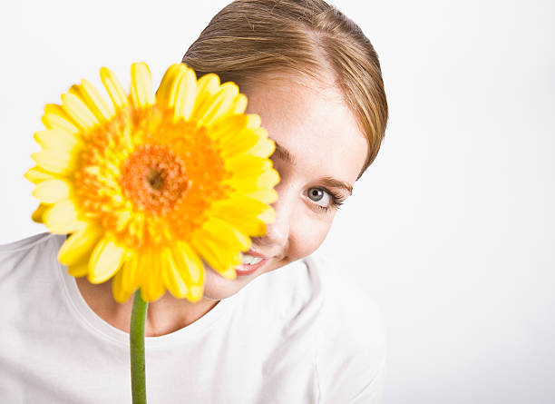 istock Woman Holding a Flower 152548236