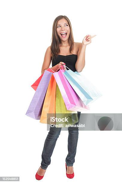 Mulher De Compras Isoladoapontar Entusiasmado - Fotografias de stock e mais imagens de Comércio - Consumismo - Comércio - Consumismo, Saco de Compras, Fazer Compras