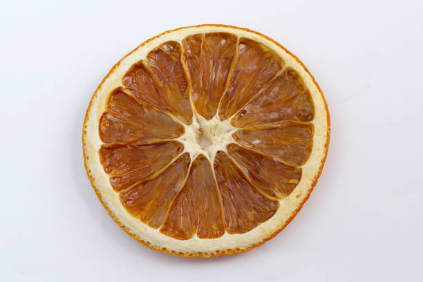 istock One dried orange slices isolated on white background 1525508419