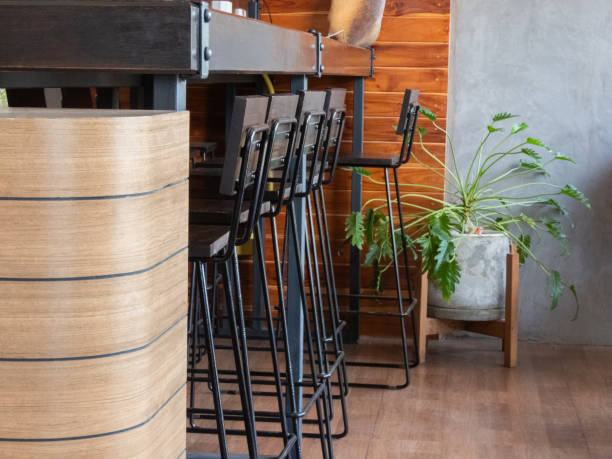 istock The sleek bar stool, with its polished metal frame and cushioned seat, exuded a modern and minimalist charm. Its tall and slender design added a touch of sophistication to any bar or kitchen counter. 1525574800