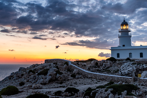 Landscape of beautiful sunset at Cavallerie Lighthouse. Menorca, Spain