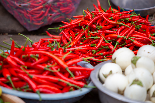 An abundance of red chillies at a farmers market