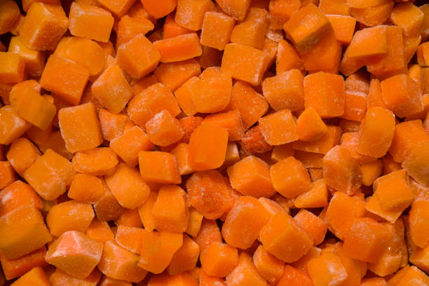 istock Roughly cut in cubes frozen butternut squash background 1525793297