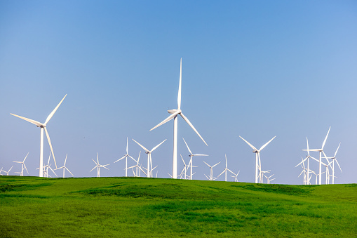 High quality stock photos of windmills, near Suisun City part of the large collection of Solano County wind project. Hundreds of turbines dot the landscape providing hundreds of megawatts in power annually.