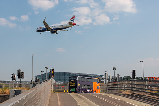 London, UK - June 14, 2023: Passenger plane Airbus A320 British Airways landing at London Heathrow Airport.