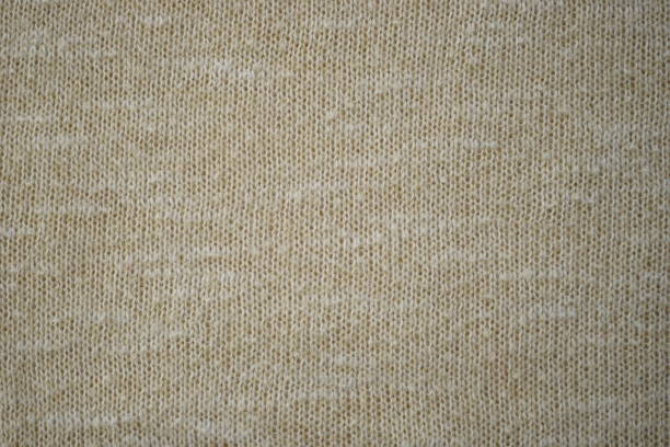 istock Beige sweater cozy pattern, knitted creamy background 1525830218