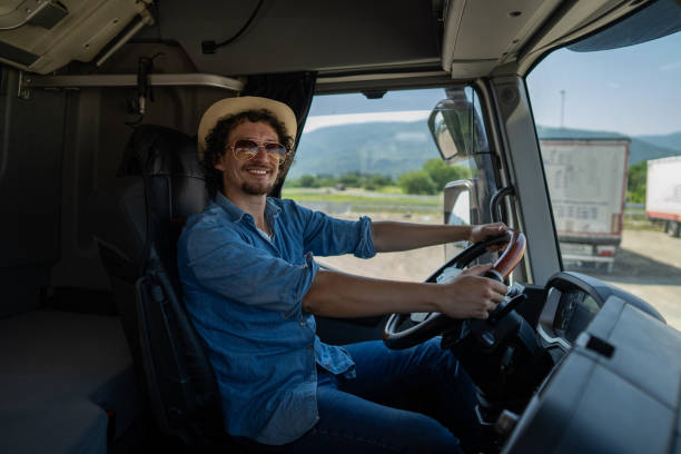 istock Man driving a truck 1525835313