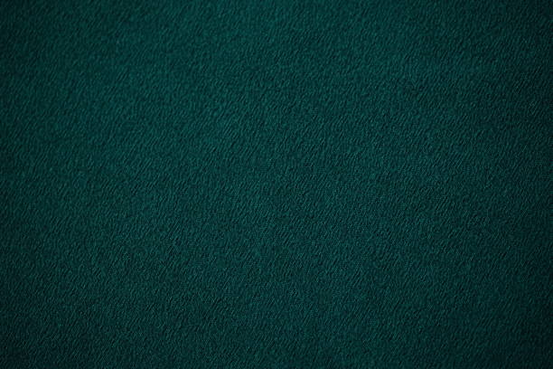 istock Delicate dark green thin fabric, emerald material chiffon blank background 1525838988