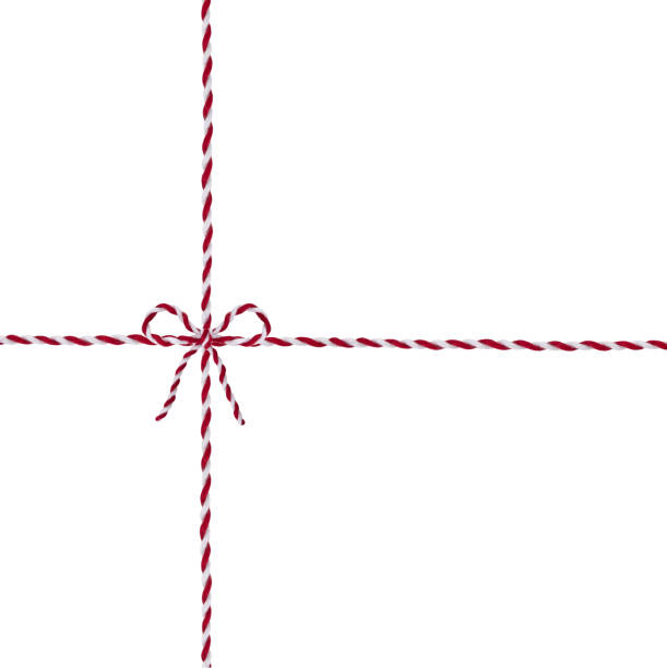 Twine rope Christmas holiday decor.Gift decoration. Parcel thread red and white color.New Year design element.