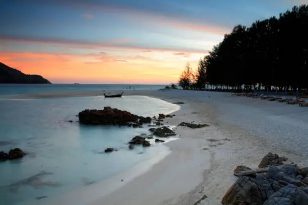 Photo of Seascape with twilight sky at dawn at Ko Lipe island, Satun