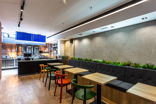 Interior of and empty modern gyros restaurant