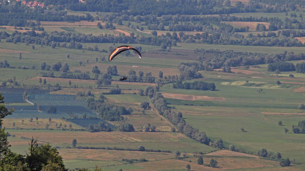 istock Paragliders in the air 1526003455