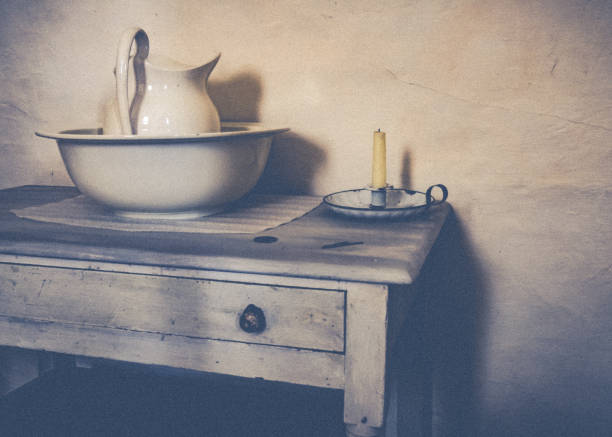 istock Old Fashioned Washing Bowl & Jug On A White Table 1526018219