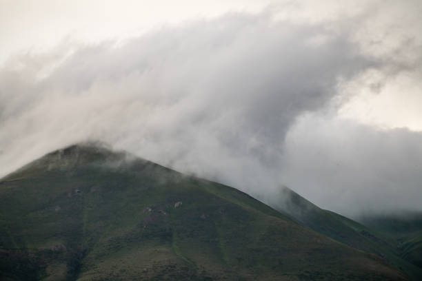 Beautiful landscape,  clouds in the mountains after rain.