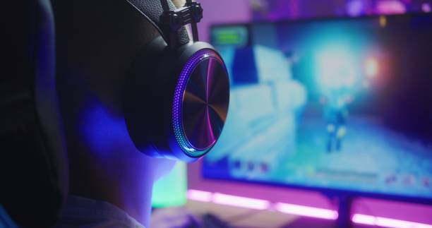 istock Gamer enjoys online video game on home PC 1526165761