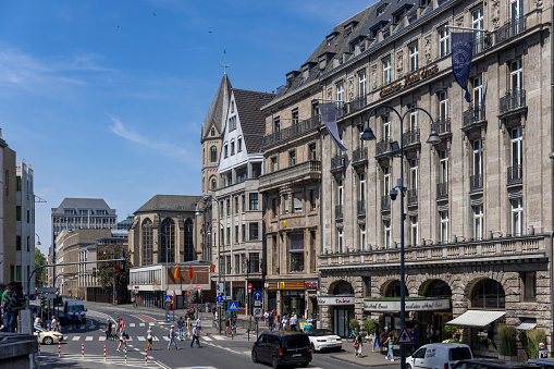 St Margaret's Street and Parliament Square with Westminster Abbey in the background. London, UK.