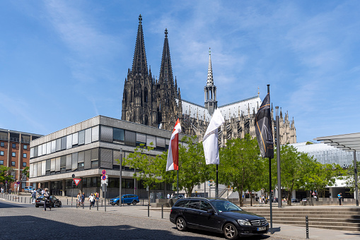 Cologne, Germany - Jun 6th 2023: Cologne cathedral is iconic and internationally known landmark in German city. It's twin towers are visible all over the city.