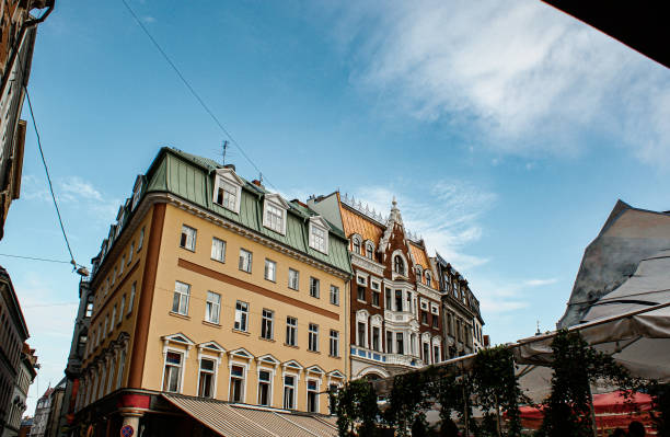 istock Low angle view of buildings against sky 1526221559